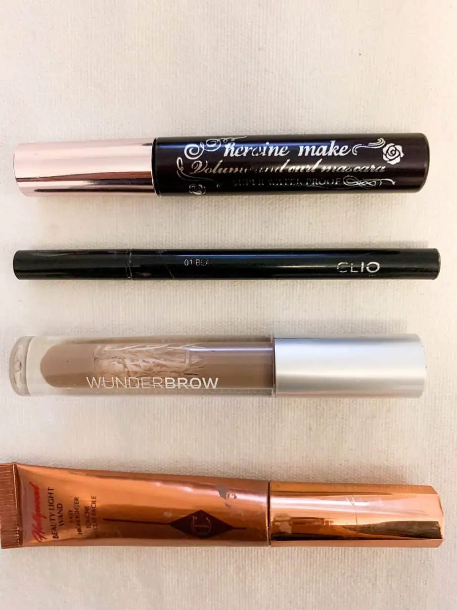 mascara, eyeliner, highlighter and eyebrow gel